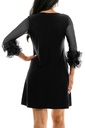 Vestido con mangas de volantes