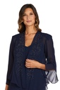 Vestido con chaqueta de gasa y pedrería