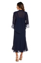 Vestido con chaqueta de gasa y pedrería