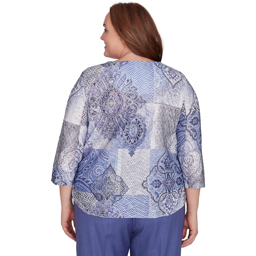 Blusa con parches de medallón