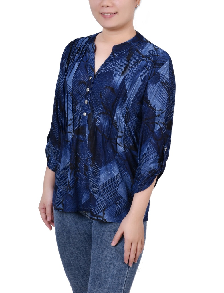 Blusa con mangas enrolladas