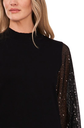 Blusa con mangas de lentejuelas