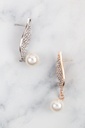 Aretes de pluma con diamantes