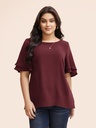 Blusa con volantes escalonados