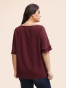 Blusa con volantes escalonados