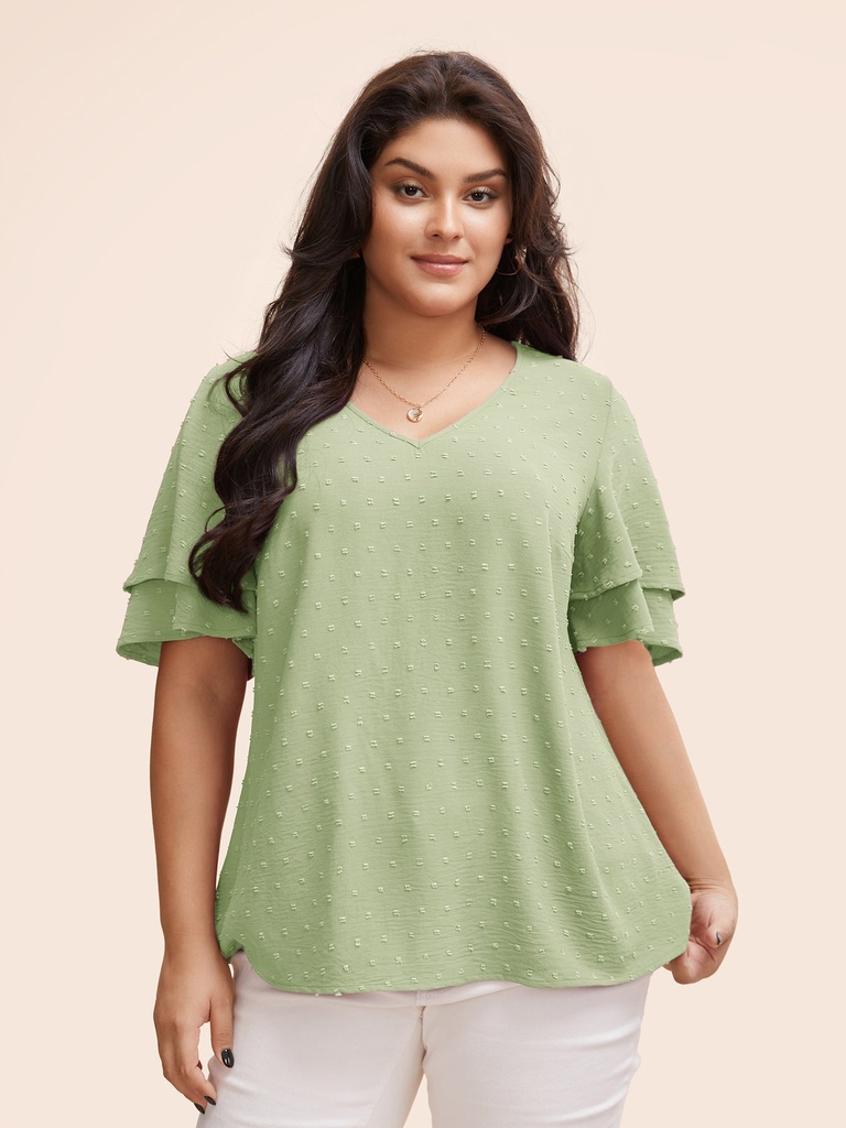 Blusa de lunares con escote en V