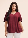 Blusa de lunares con escote en V
