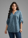 Blusa floral con mangas abotonadas