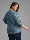 Blusa floral con mangas abotonadas