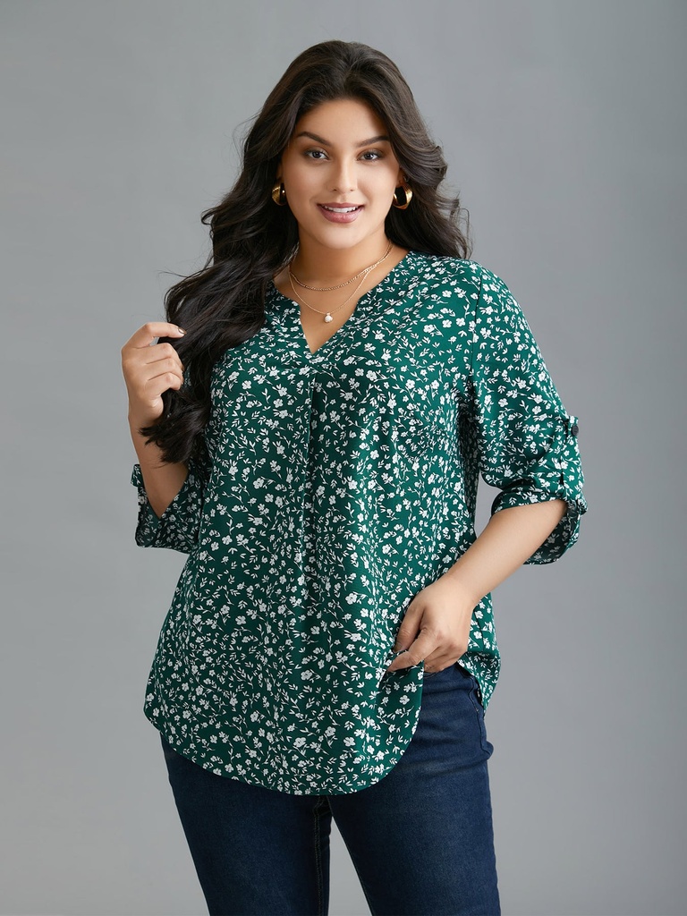 Blusa floral con mangas abotonadas
