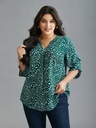 Blusa floral con mangas abotonadas