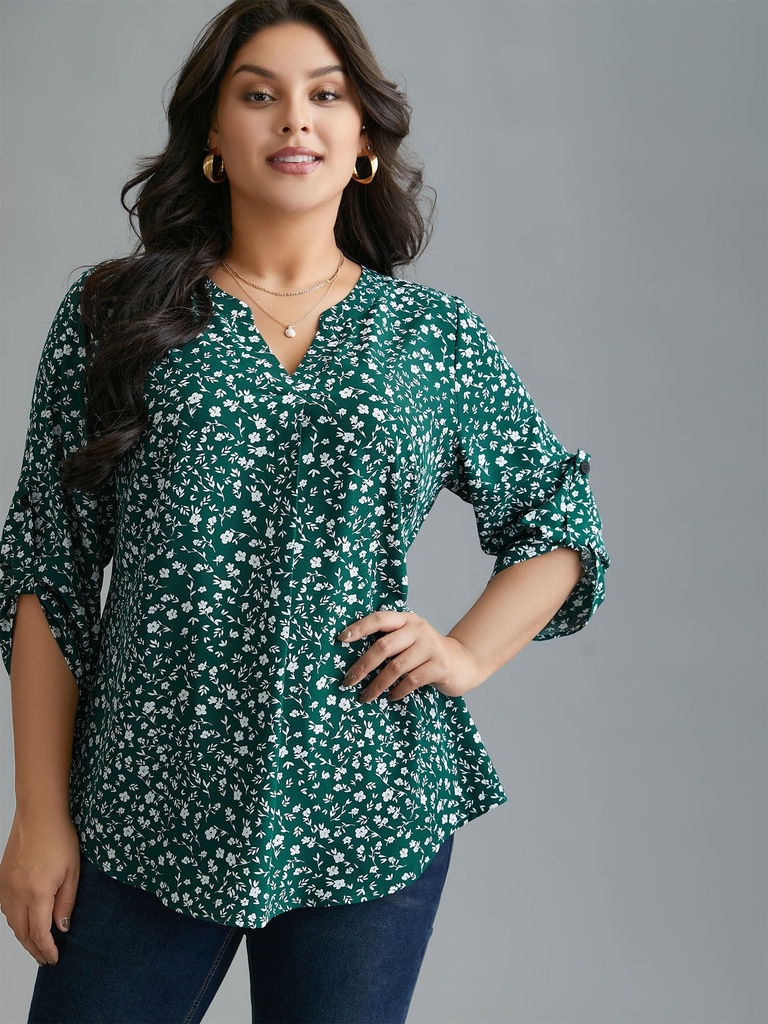Blusa floral con mangas abotonadas