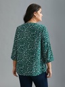 Blusa floral con mangas abotonadas