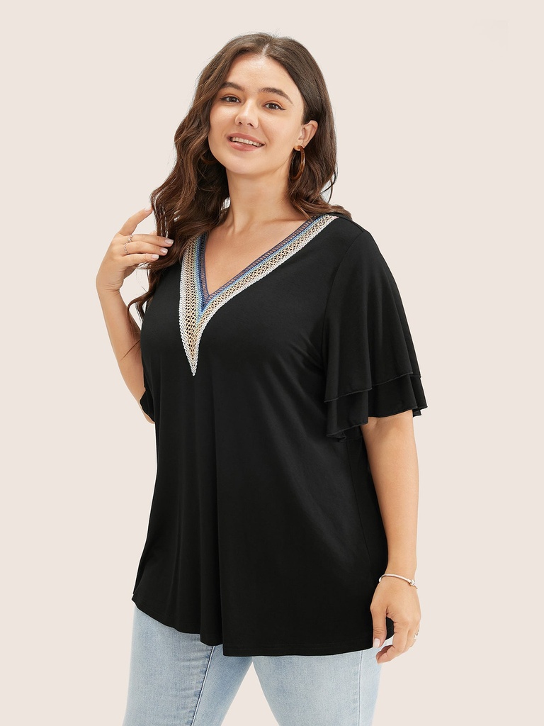Blusa con escote bordado