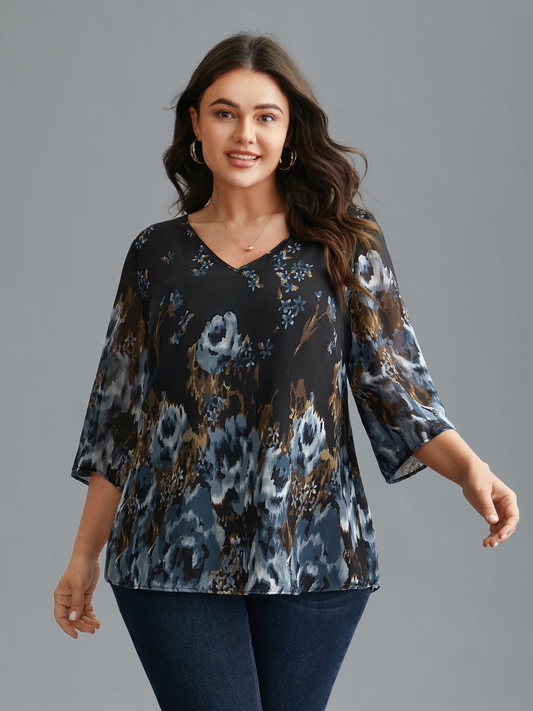Blusa con mangas de gasa floral