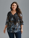 Blusa con mangas de gasa floral
