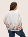Blusa con mangas de murciélago floral