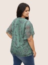 Blusa de gasa con mangas de pétalo