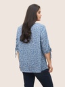Blusa con mangas anudadas