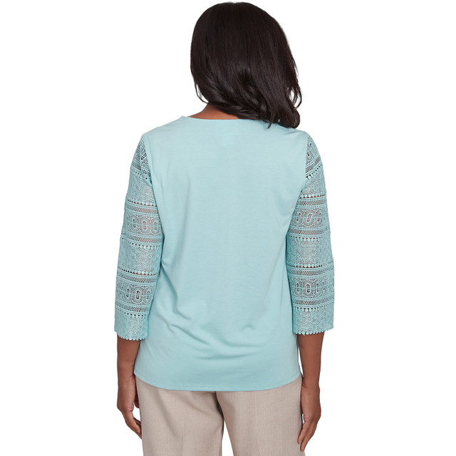Blusa bordada con flores bohemias