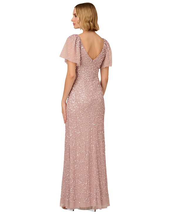 Vestido con capa y frente retorcido