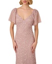 Vestido con capa y frente retorcido