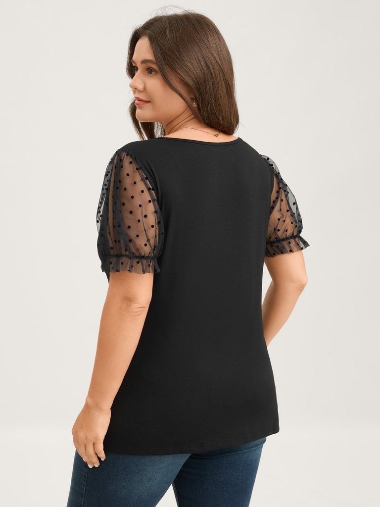 Blusa lisa con mangas de malla Polka