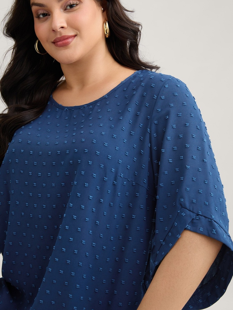 Blusa texturizada de cuello redondo