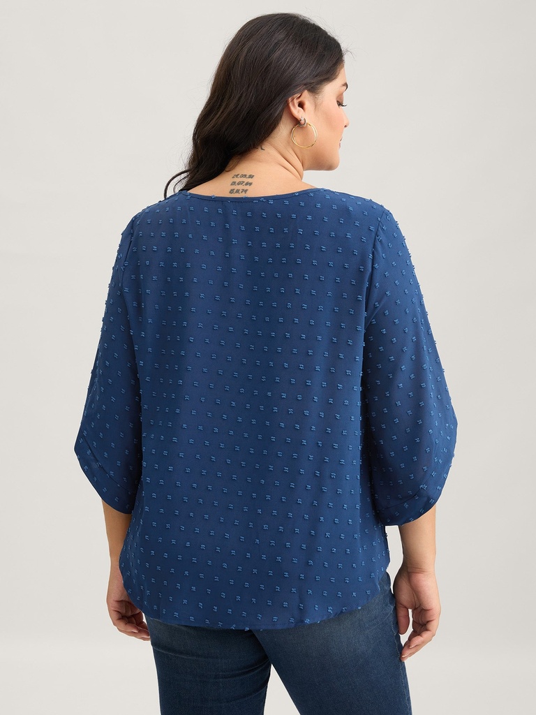 Blusa texturizada de cuello redondo