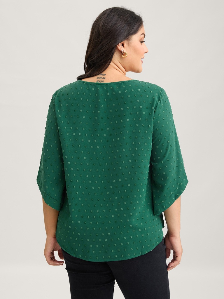 Blusa texturizada de cuello redondo