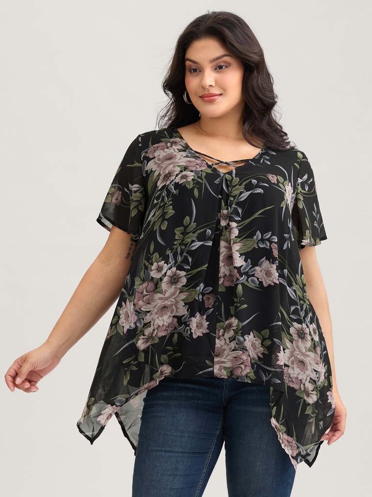 Blusa con mangas de murciélago floral