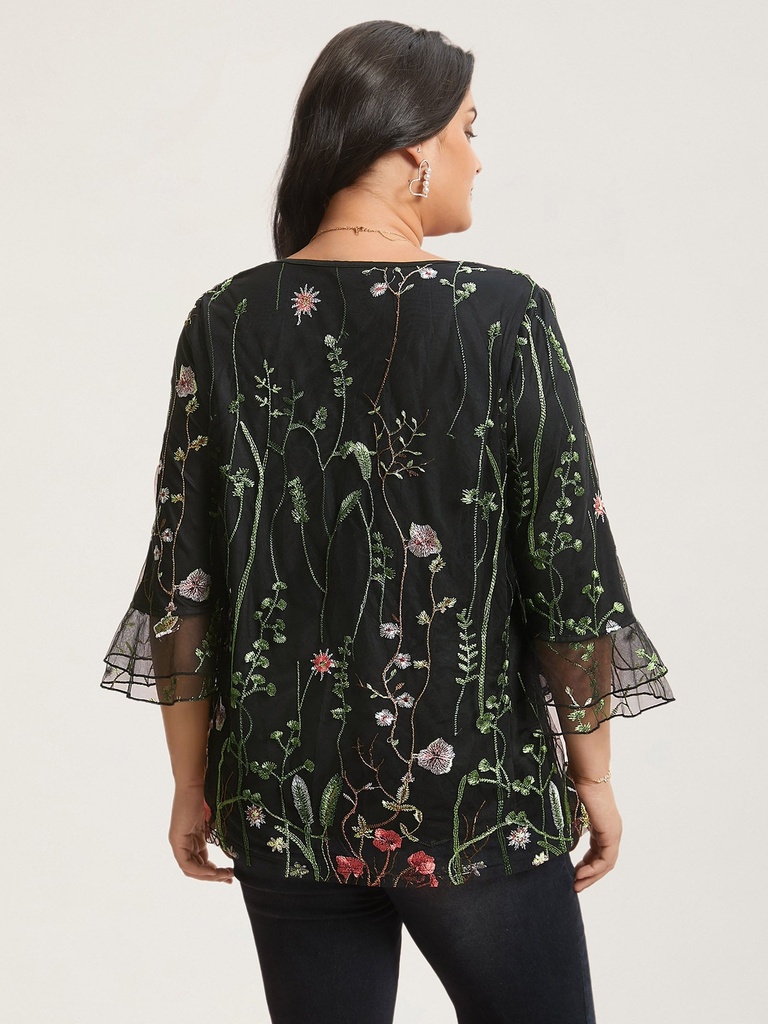 Blusa de malla de bordado floral