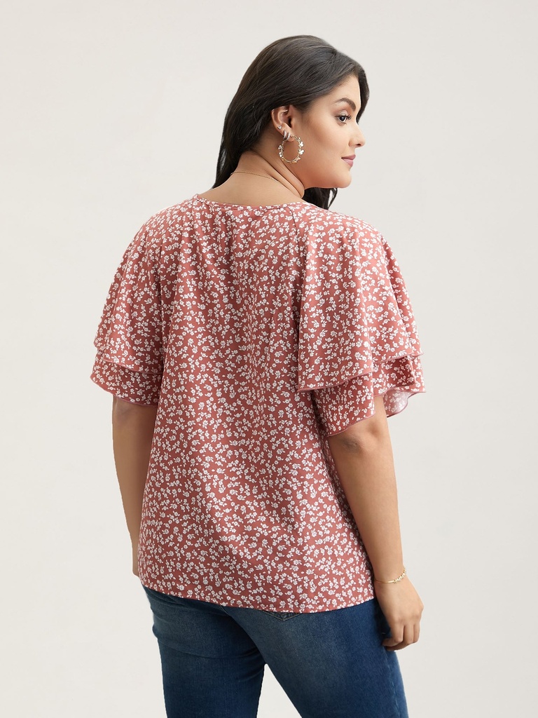 Blusa con volantes escalonados