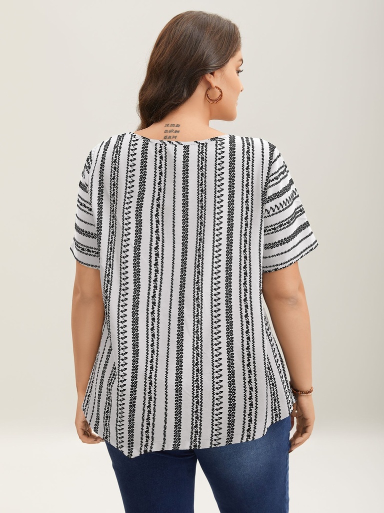 Blusa con volantes escalonados