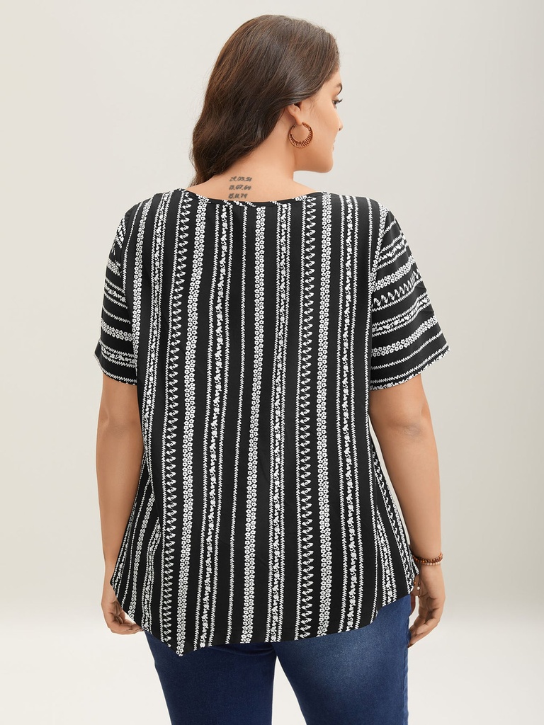 Blusa con volantes escalonados
