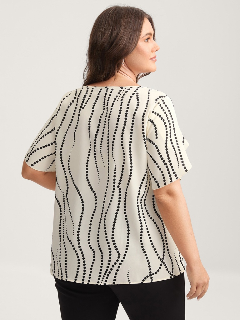 Blusa con volantes escalonados