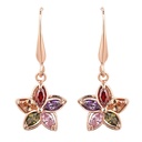 Aretes colgantes de flor