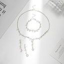 Juego de collar con aretes de perlas