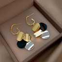 Aretes colgantes con diamantes