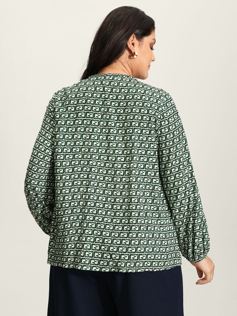 Blusa floral con mangas abullonadas