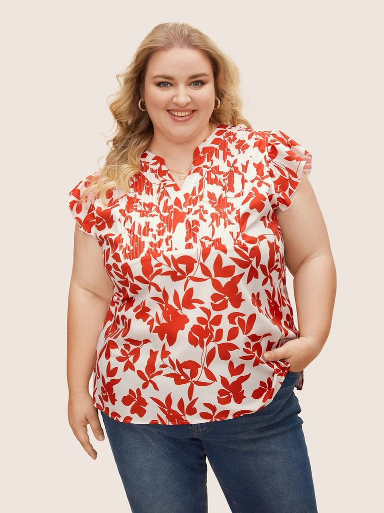 Blusa floral con detalles plisados