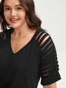 Blusa de mangas recortadas