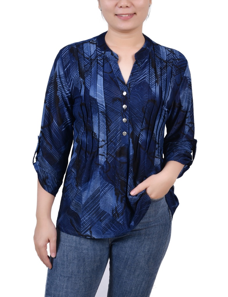 Blusa con mangas enrolladas