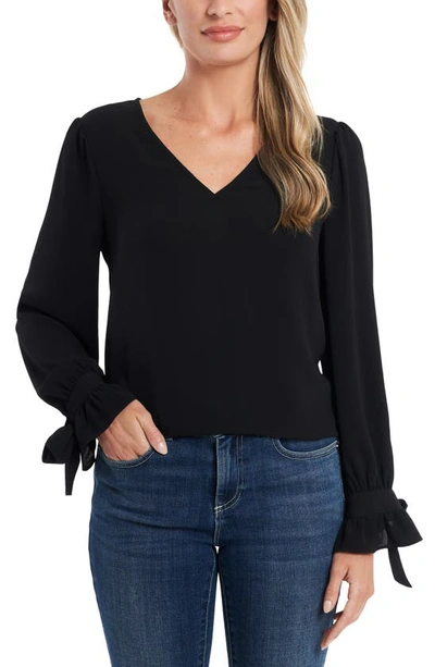 Blusa de crepe con mangas anudadas