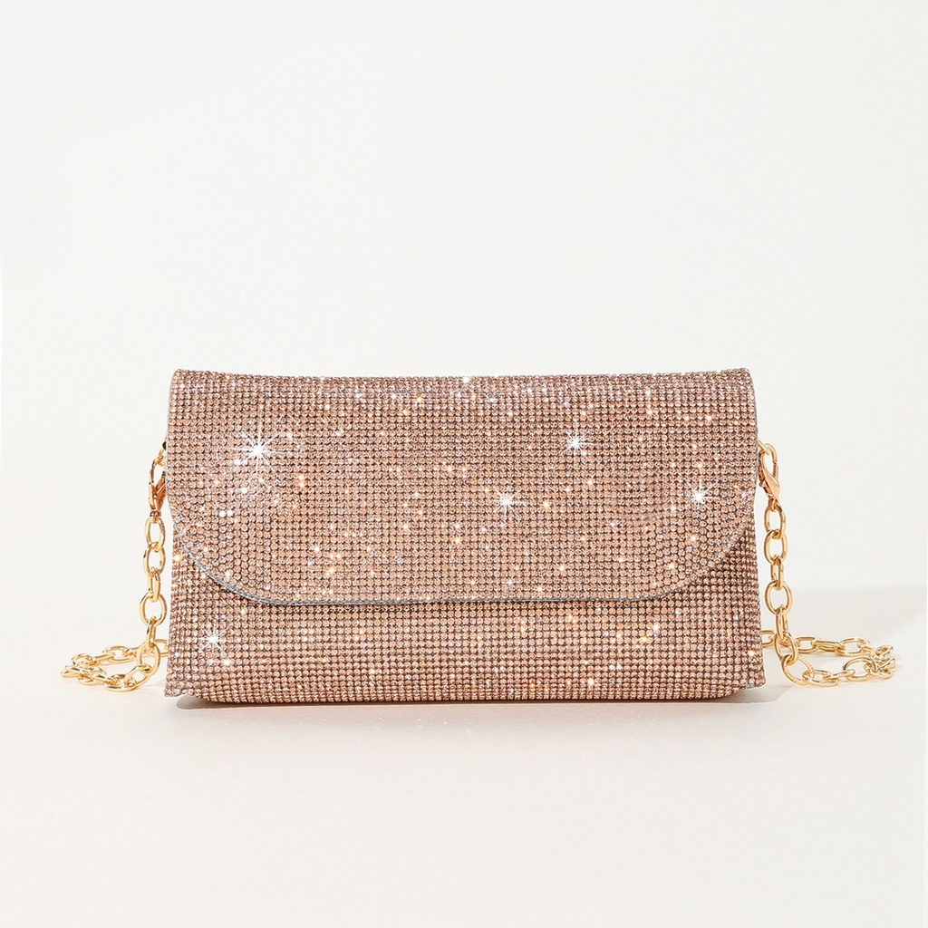 Bolso brillante con correa