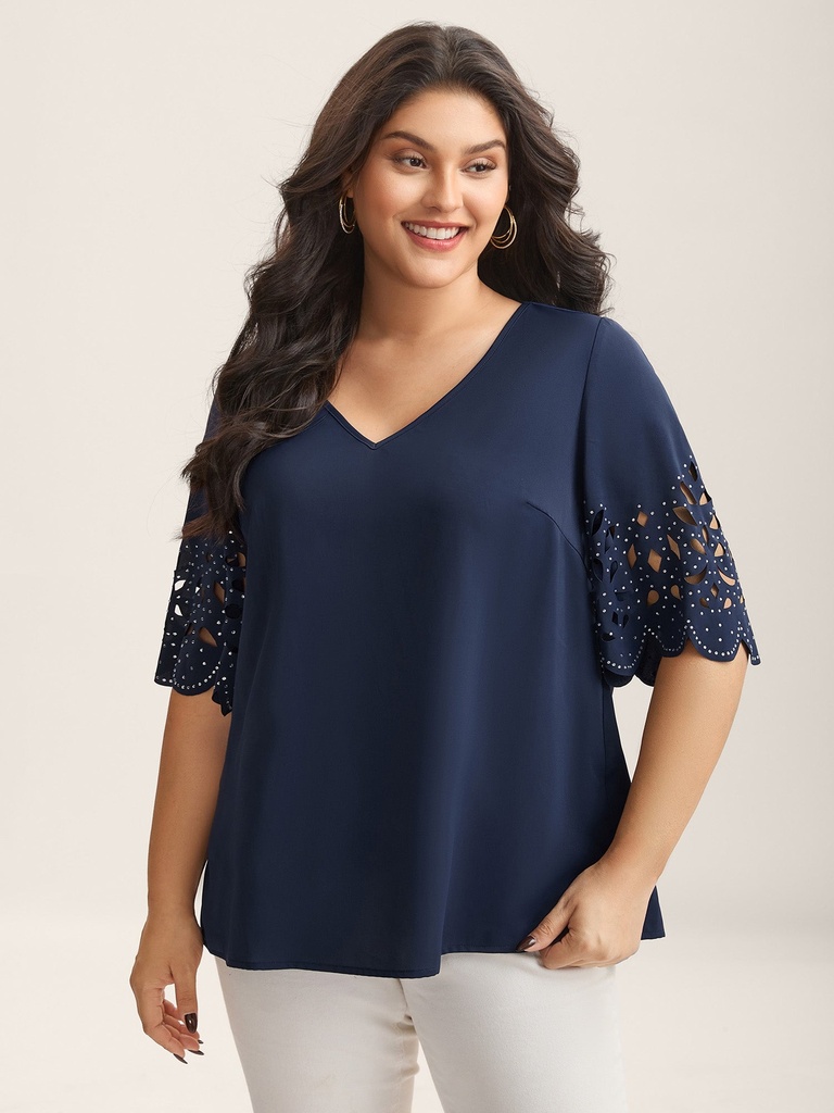 Blusa con mangas con recortes