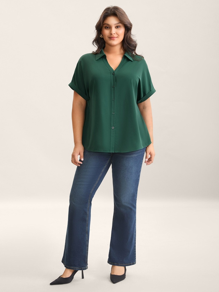 Blusa camisera con mangas enrolladas