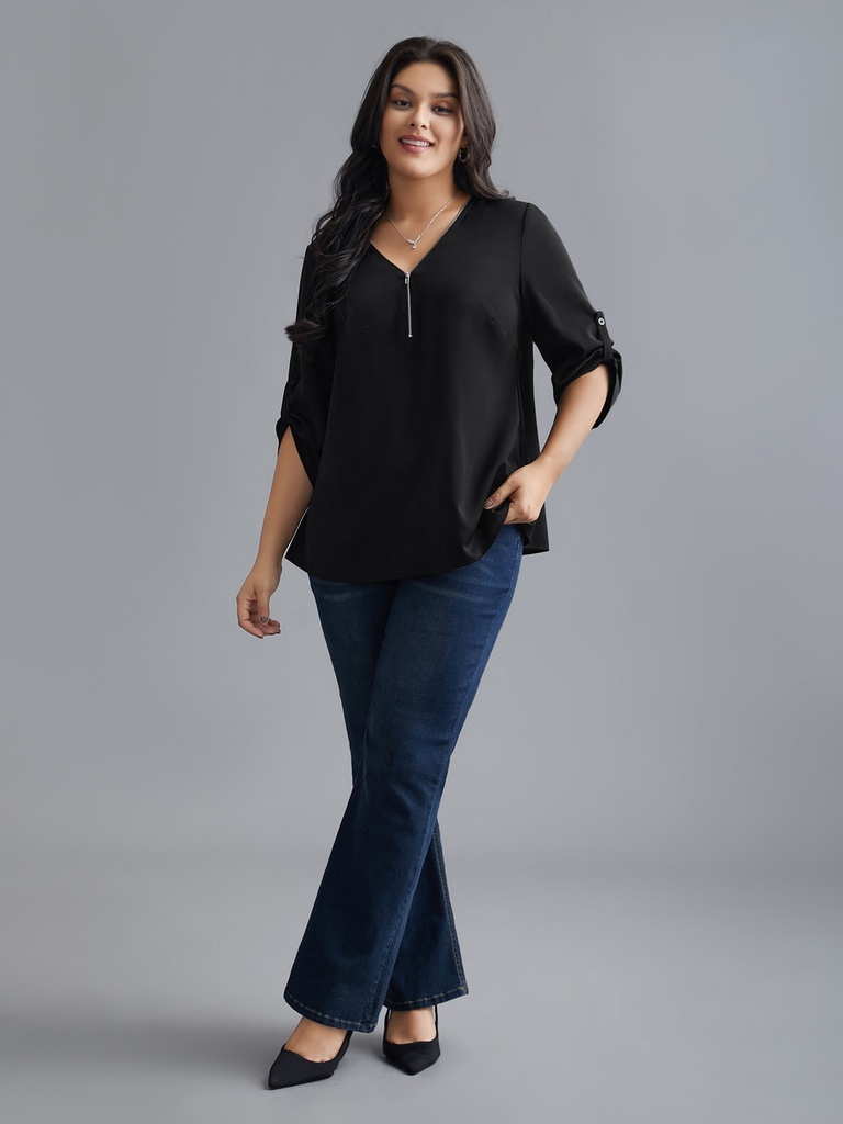 Blusa con escote de cremallera