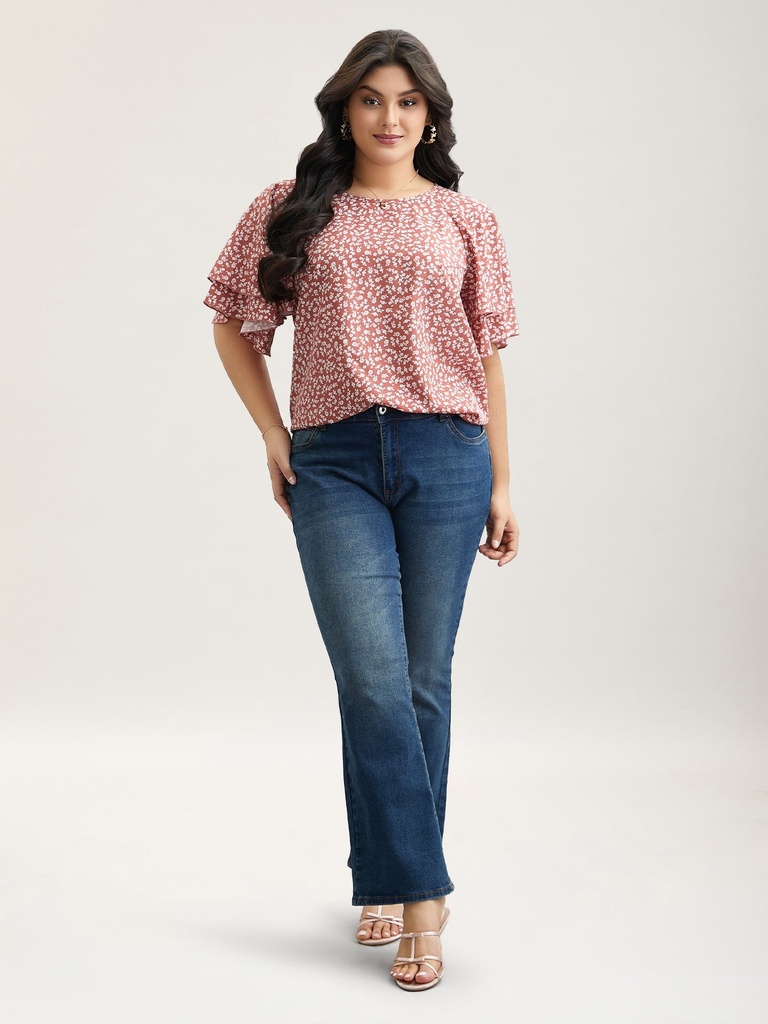 Blusa floral con volantes escalonados