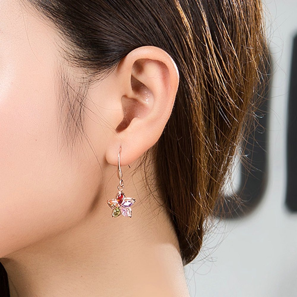 Aretes colgantes de flor